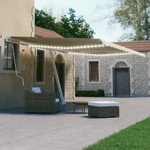 vidaXL Auvent manuel rétractable avec LED 600x300 cm Crème pas cher