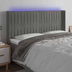 vidaXL Tête de lit à LED Gris clair 203x16x118/128 cm Velours pas cher