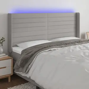 Comparateur de prix : vidaXL Tête de lit à LED Gris clair 183x16x118/128 cm Tissu