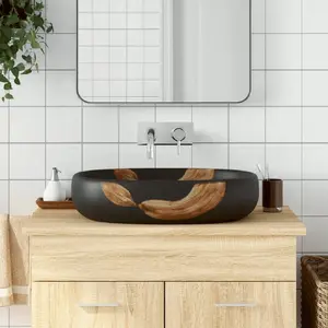 Comparateur de prix : vidaXL Vasque à poser noir ovale 59x40x14 cm céramique