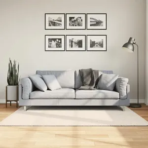 Comparateur de prix : vidaXL Tapis ISTAN à poils longs aspect brillant crème 140x200 cm