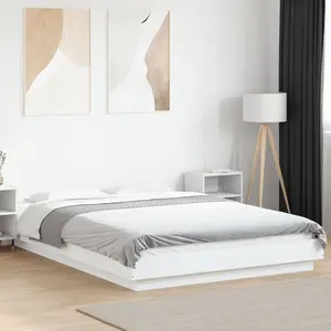 vidaXL Cadre de lit avec lumières LED blanc 140x190 cm bois ingénierie pas cher