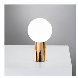 Comparateur de prix : Zafferano Lampe de table Olimpia Pro en or poli, rechargeable et dimmable
