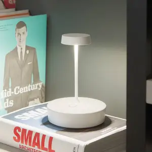 Comparateur de prix : Zafferano Lampe de table LED rechargeable et dimmable Swap mini pro Blanche