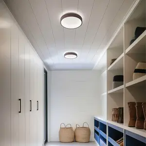 Linea Light Applique murale LED Iside, marron, métal, Ø 35 cm, IP40Vendu parluminaire
