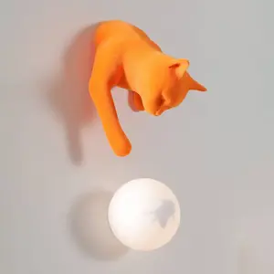 Karman Applique murale Maoo, céramique orange, verre, figurine de chat