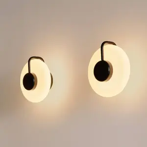 kdln Applique murale LED TRATTO, noir, Ø 27 cm, métal/verreVendu parluminaire