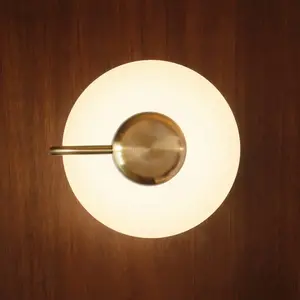 kdln Applique murale LED TRATTO, laiton, Ø 27 cm, métal/verreVendu parluminaire