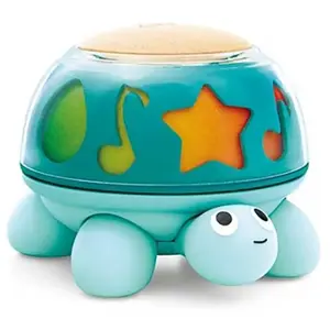 Boîte à musique tortue d'éveil lumineuse rotative Hape