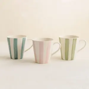 Comparateur de prix : Novastyl Lot de 6 tasses 20cl en grès blanc et rayures colorées