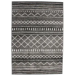 THEDECOFACTORY VENISE - Tapis toucher laineux imprimé motifs ethniques noir 133x190 pas cher