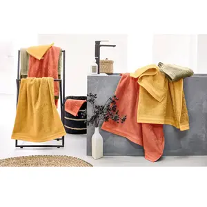 TRADILINGE Lot de 2 serviettes invité en éponge coton jaune ocre 33x50 cm pas cher