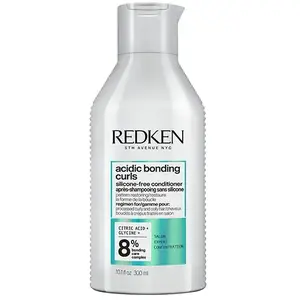 Comparateur de prix : Redken Après-shampoing réparateur pour cheveux bouclés abimés 300 ml E4154100