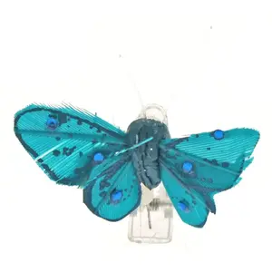 RueDeLaFete Sachet 4 Mini-Papillons STRASS sur pincette 3,5cm Turquoise pas cher
