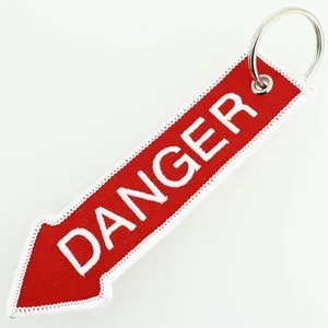 Comparateur de prix : CLJ - Porte-clés - Flèche rouge Danger - Rouge et blanc - Véhicules - Sécurité
