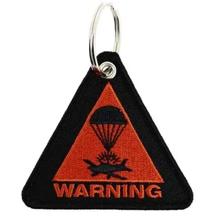 Comparateur de prix : Porte clé Clj Charles Le Jeune  Porte-clés Avion Parachute Warning - Triangle orange