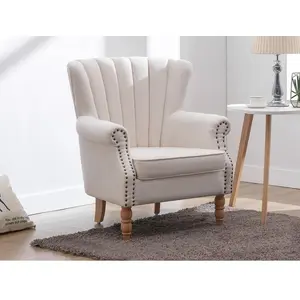 VENTE-UNIQUE Fauteuil en tissu crème finition cloutée BATOUMI pas cher