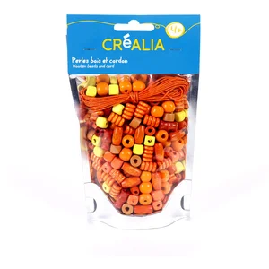 Sachet de perles oranges en bois avec cordon - Créalia