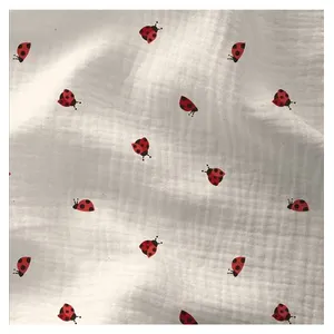 Tissu double gaze coccinelles vendu par 50 cm(...) - 0 Ecru