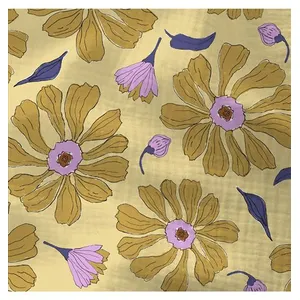 Tissu coton double gaze imprimé fleurs jaunes et violettes vendu au mè...