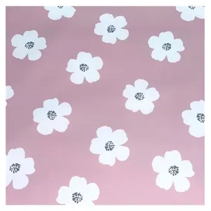 Tissu imperméable fleurs sur fond rose vendu au mètre(...) - 00 Rose