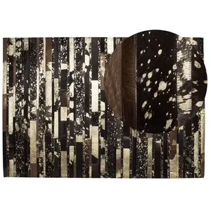 Comparateur de prix : BELIANI Tapis Patchwork 160 x 230 cm en Peau de Vache Marron Beige et Noir Fait Main Artvin