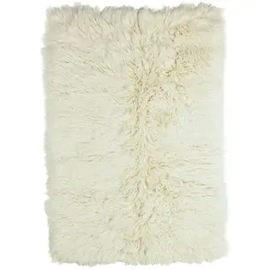 THEKO Tapis flokati en laine vierge naturel 70x140 cm pas cher