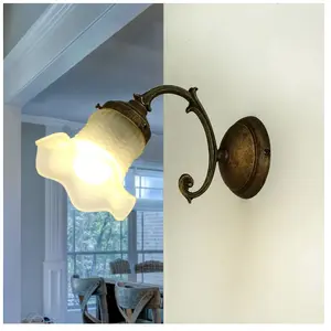 Licht-Erlebnisse Applique d'intérieur Ricciolo de couleur bronze antique au design floral en laiton E14 H:14cm - Bronze antique, blanc pas cher
