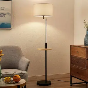 Comparateur de prix : Lindby lampadaire Zinia, noir, tablette, prise USB