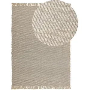 BELIANI Tapis beige à motif rayé 140 x 200 cm ALADAG
