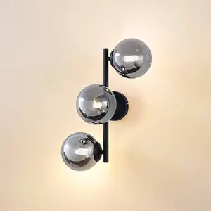 Lindby Applique murale Orbelia, noir, à 3 lampes, verre, G9 pas cher