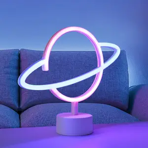 JUST LIGHT. Lampe de table LED Neon Saturn, batterieVendu parluminaire