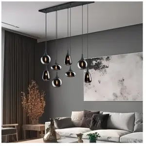 Comparateur de prix : Trio Lighting Suspension Lumina, à 8 lampes, noir/chromé, verre