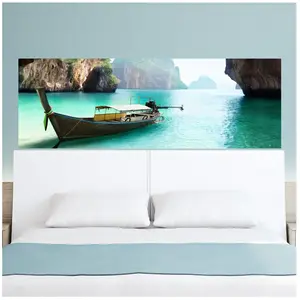 Ambiance-sticker Sticker tête de lit Pirogue sur une mer paradisiaque pas cher