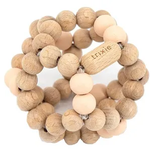 Trixie Balle de préhension en bois rose pas cher