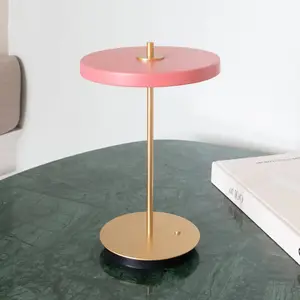 UMAGE Asteria Move, lampe à poser LED rechargeable, rosé/laiton, 31 cmVendu parluminaire