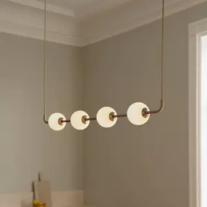Suspension LED UMAGE Audrey LINEAR, laiton, 118 cm, à 4 lampes.Vendu parluminaire