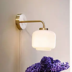 Comparateur de prix : Dyberg Larsen, applique murale Arp, couleur laiton, largeur 15 cm