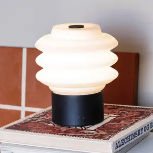Dyberg Larsen Lampe à poser LED rechargeable Diva, blanc/noir pas cher
