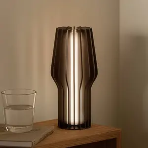 Comparateur de prix : EVA Solo Lampe à poser LED rechargeable Radiant, noir, caoutchouc, IP4...