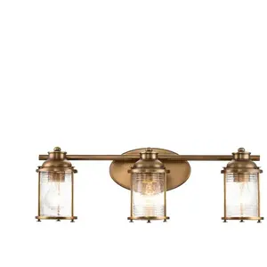 ELSTEAD LIGHTING Applique murale en métal et verre clair grainé laiton naturelVendu parluminaire