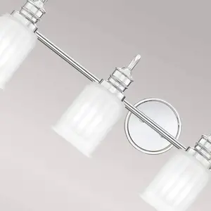 QUOIZEL Applique murale Swell IP44, à 4 lampes, chrome poliVendu parluminaire