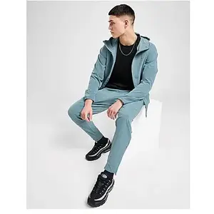Pantalon avec ouvertures à zip Nike Dri-FIT Unlimited pour homme - Ble... pas cher