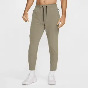 Pantalon avec ouvertures à zip Nike Dri-FIT Unlimited pour homme - Ver...Vendu paramazon