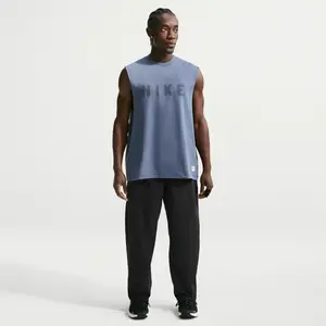 Pantalon de training tissé Nike N.A.C. Dri-FIT pour homme - Noir S IF2... pas cher