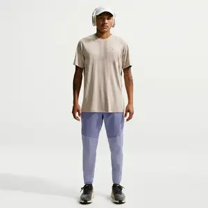 Pantalon de running tissé déperlant Nike Stride pour homme - Pourpre L IF2020-506