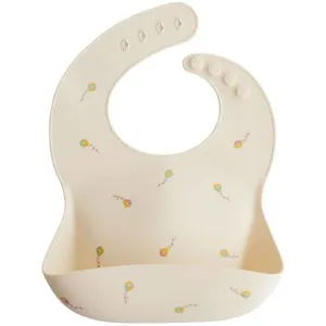 Mushie Bavoir à poche en silicone Kite pas cher