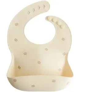 Mushie Bavoir à poche en silicone Pretzel pas cher