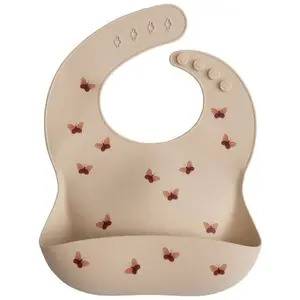 Comparateur de prix : Mushie Bavoir à poche en silicone Butterflies