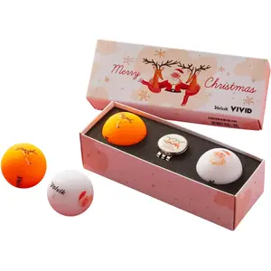 Lot de 4 balles + marqueur et tees de golf Volvik X-Mas